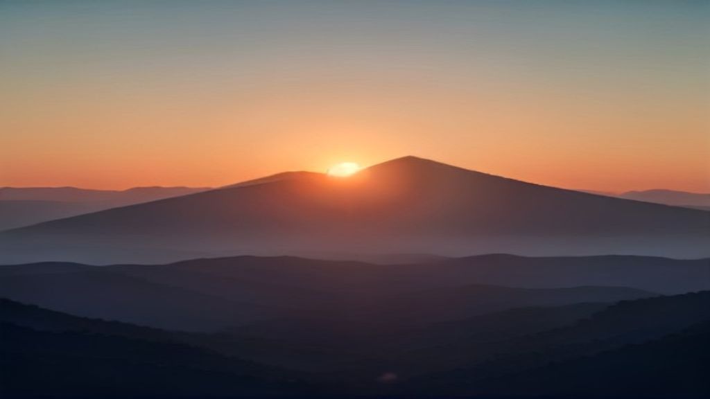 Tiny Orange Sun Setting Behind Simple Layered Mountains,